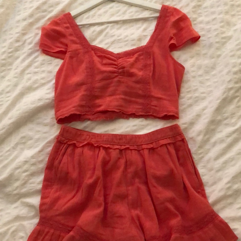 Two piece salmon-pink set worn once